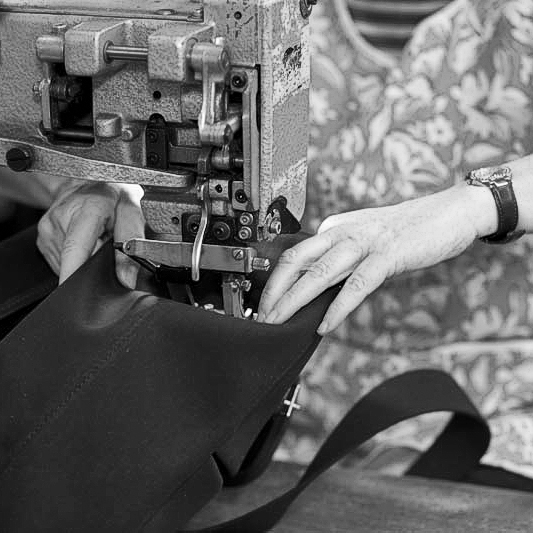 An Original Peter Record Hunting Bag being sewn by hand on a sewing machine. The Original Peter manufacturing process in action, showing one of our Original Peter Record Hunting Bags being hand made by Brady Bags in Walsall, England to the highest specification with the highest quality materials.